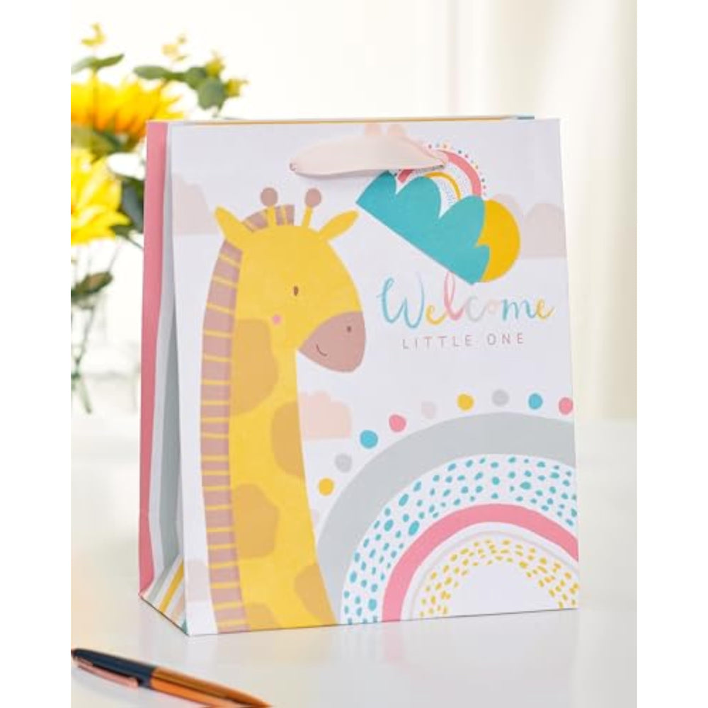 UK Greetings medium gift bag with cute giraffe design for new baby boy or girl, featuring cheerful animal illustration.