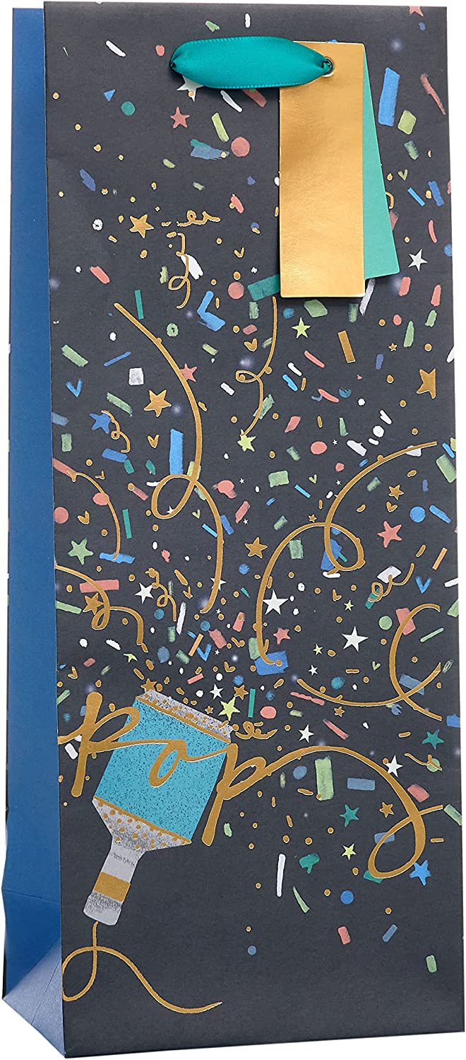 UK Greetings party popper design bottle gift bag for gifts, featuring colorful party-themed graphics and sturdy paper construction.