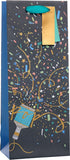UK Greetings party popper design bottle gift bag for gifts, featuring colorful party-themed graphics and sturdy paper construction.