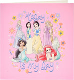 Disney Princess gift wrap with matching gift tag and card from UK Greetings, featuring colorful princess characters and decorative designs.