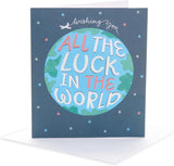 UK Greetings Good Luck Card featuring a world design, suitable for Her or Him, with vibrant colors and artistic details.