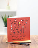 UK Greetings 21st birthday greeting card with red design, suitable for him, her, or friends, featuring celebratory artwork.
