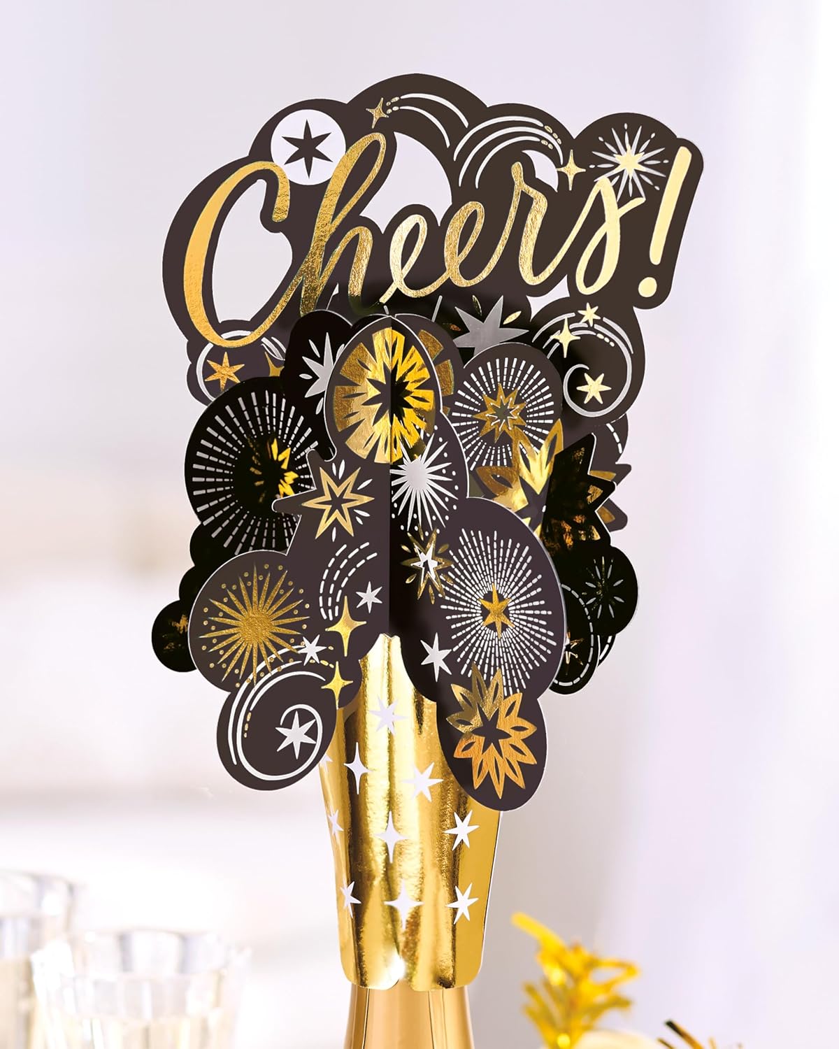 UK Greetings bottle topper greeting card for celebrations, featuring colorful fun social stationery design.