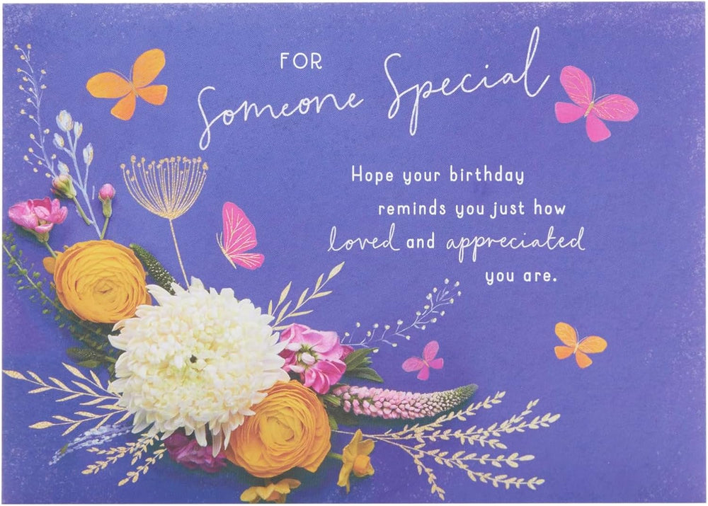 UK Greetings elegant blue floral birthday greeting card with blank inside for personal message.