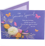 UK Greetings elegant blue floral birthday card with blank inside for personal message, featuring a sophisticated floral design.
