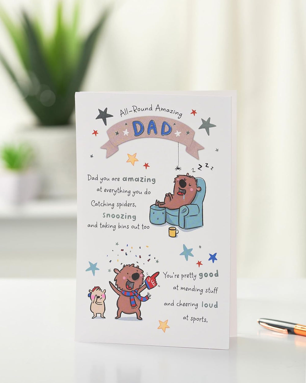 UK Greetings Father's Day card for Dad featuring a witty design, showcasing colorful graphics and playful text on the front.