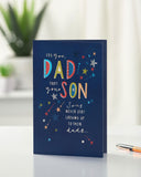UK Greetings Father's Day greeting card from your son featuring a stars design, showcasing a heartfelt message and festive imagery.