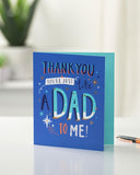 UK Greetings Father's Day greeting card for him with a blue design, featuring a heartfelt message and decorative elements.