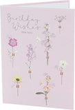 Cute floral birthday card for her and friends by UK Greetings, featuring a charming meadow design and heartfelt birthday wishes.