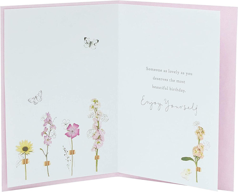 Cute floral birthday card for her and a friend from UK Greetings with a meadow design and heartfelt birthday wishes.