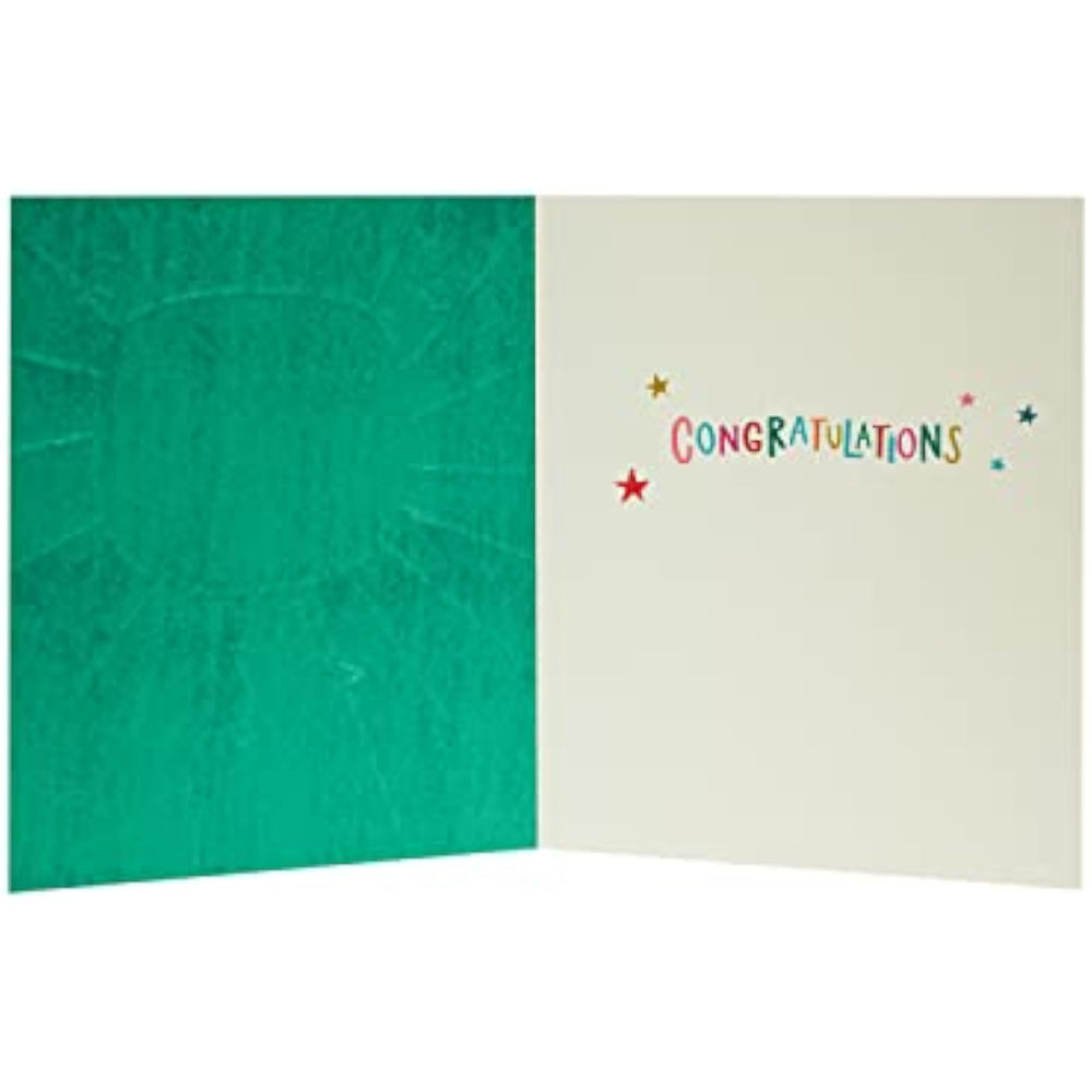 UK Greetings exams pass congratulations card featuring colorful design and cheerful message for celebrating exam success.