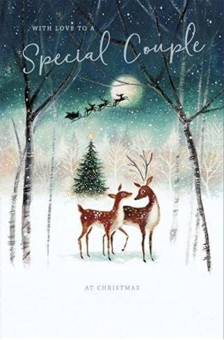 Special Couple 'Happy Christmas' greeting card by UK Greetings featuring a reindeer in snow, perfect for celebrating the holiday together.
