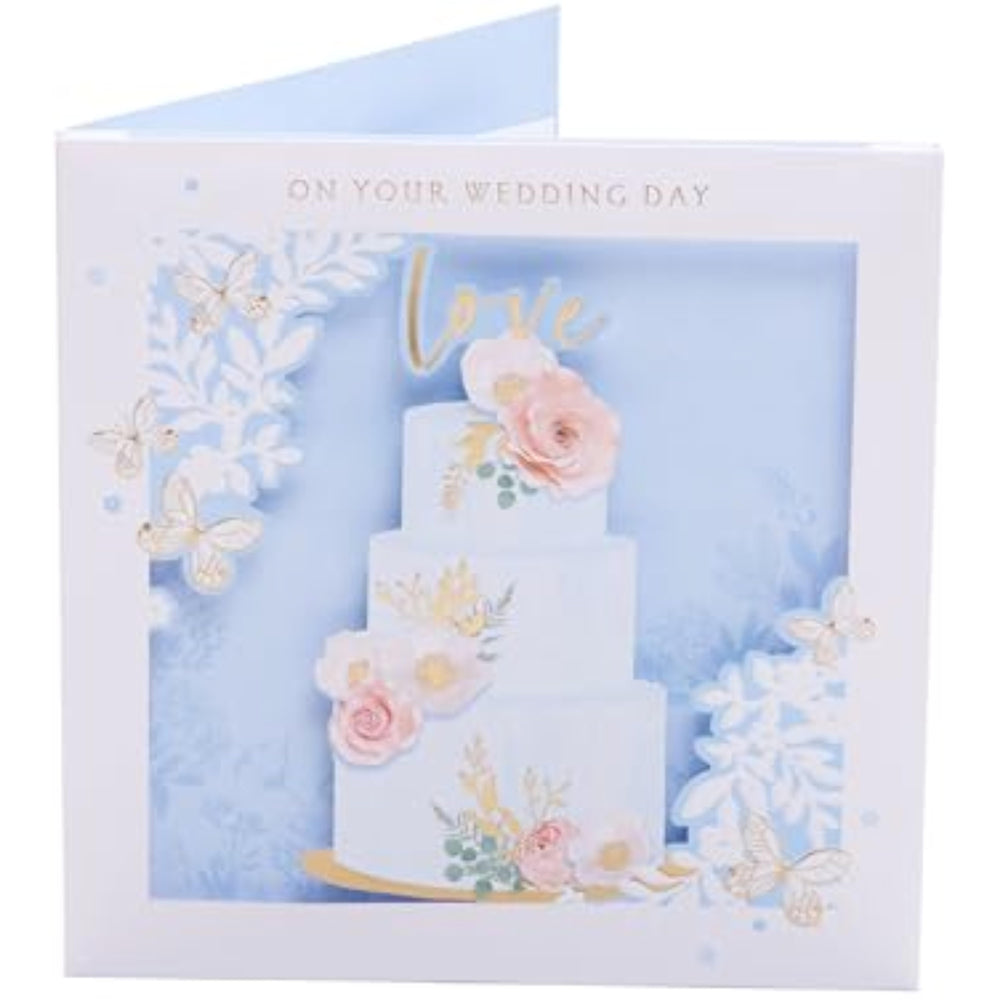 UK Greetings wedding greeting card with 3D cake design, featuring a festive and elegant appearance for special occasions.