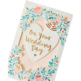 UK Greetings 3D pop-up floral wedding greeting card with intricate floral design and elegant wedding theme.