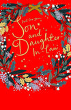 UK Greetings Christmas greeting card featuring "A Wonderful Son & Daughter-in-Law" with festive foiled accents.