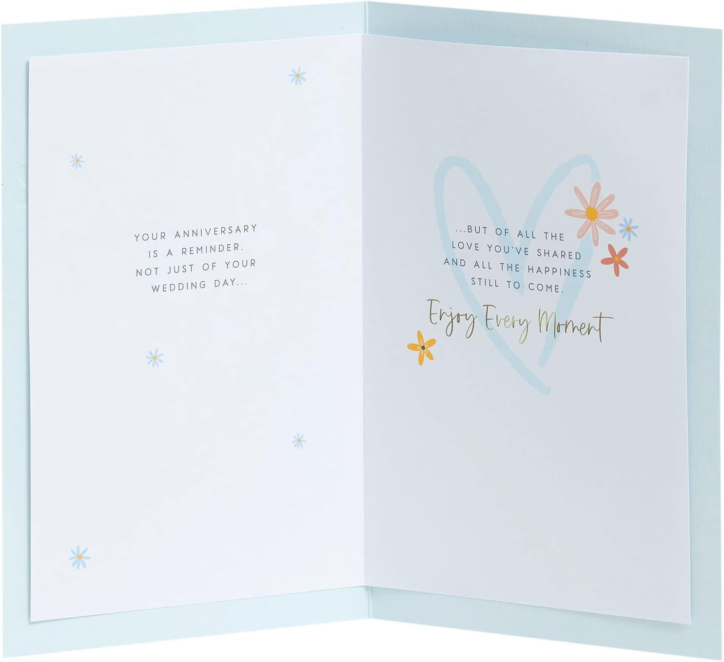 UK Greetings anniversary greeting card for him, her, or friends featuring a floral heart design and romantic message.