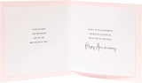 UK Greetings anniversary greeting card featuring a happy couple, perfect for celebrating a special milestone together.