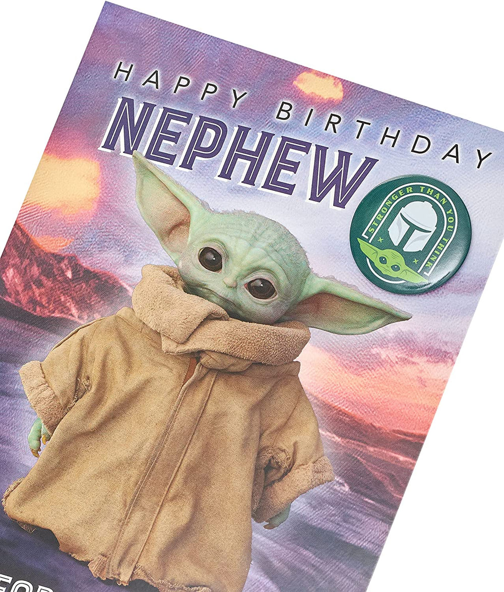 UK Greetings Baby Yoda Nephew birthday greeting card with badge, featuring Baby Yoda design and festive decorations.