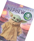 UK Greetings Baby Yoda Nephew birthday greeting card with badge, featuring Baby Yoda design and festive decorations.