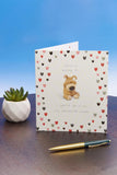 UK Greetings Bday Boofle greeting card featuring colorful illustrations, perfect for celebrating birthdays with a cute character design.