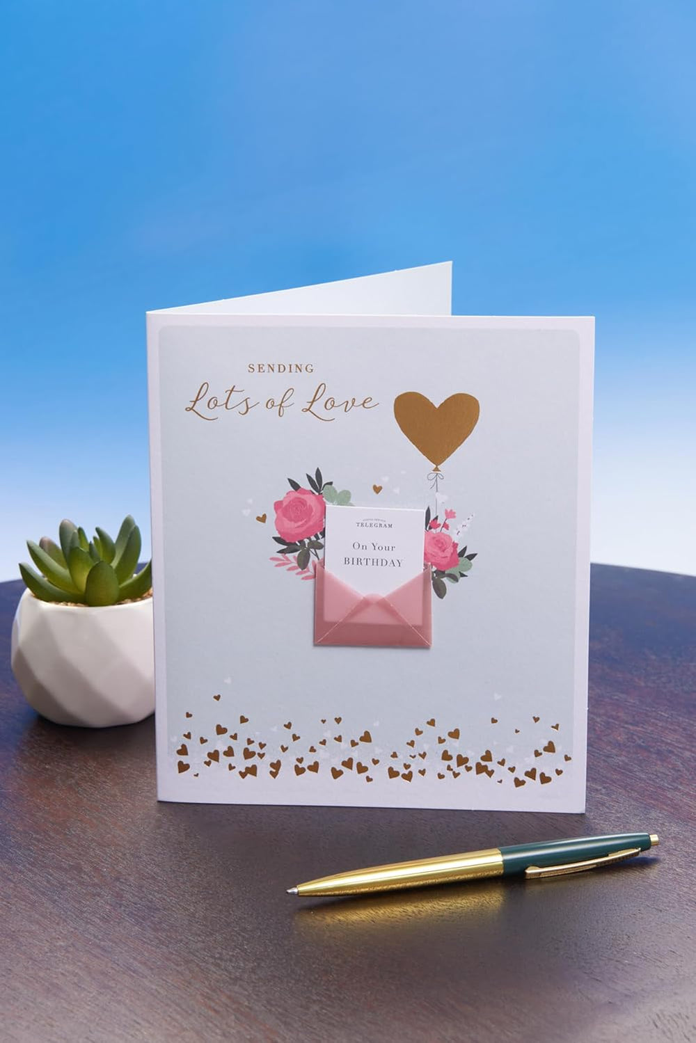 UK Greetings Bday Paper Charm greeting card featuring 90 colorful paper charm illustrations for birthday celebrations.