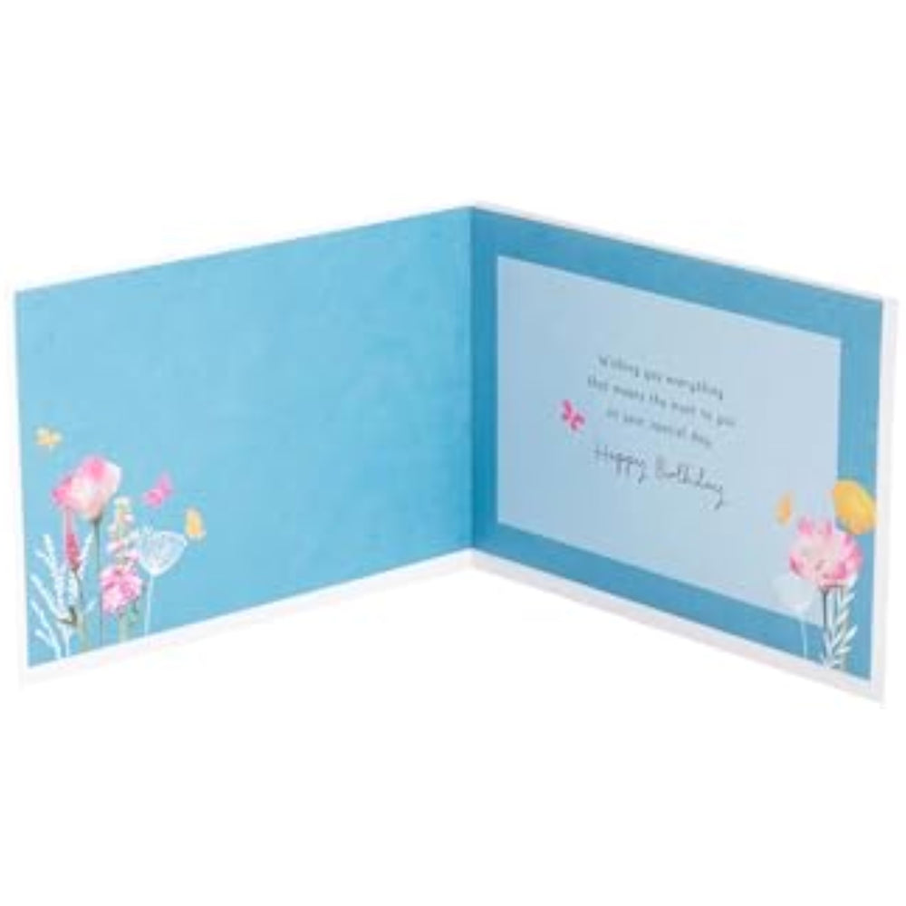 UK Greetings floral birthday card featuring beautiful flower illustrations, perfect for sending warm birthday wishes to friends.