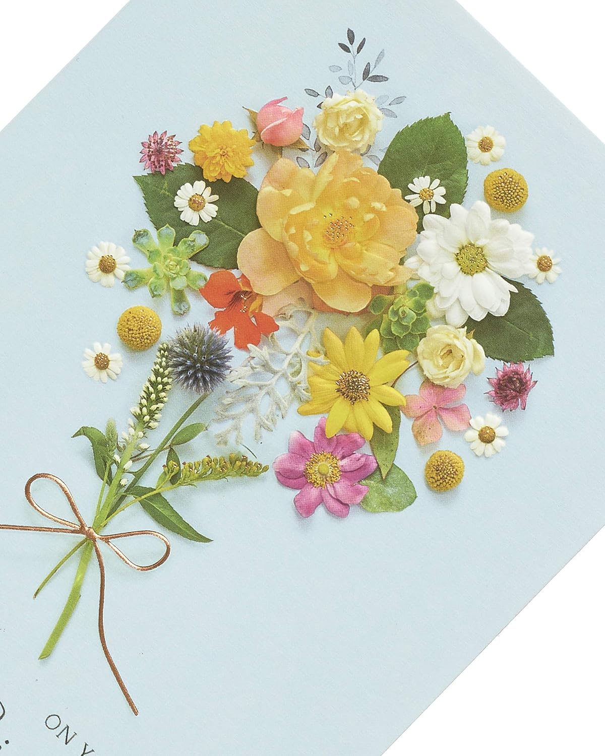 UK Greetings birthday card featuring a beautiful floral posy design on the front.
