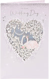 UK Greetings wedding greeting card featuring a beautiful swan design with silver foil finishes, ideal for special wedding celebrations.