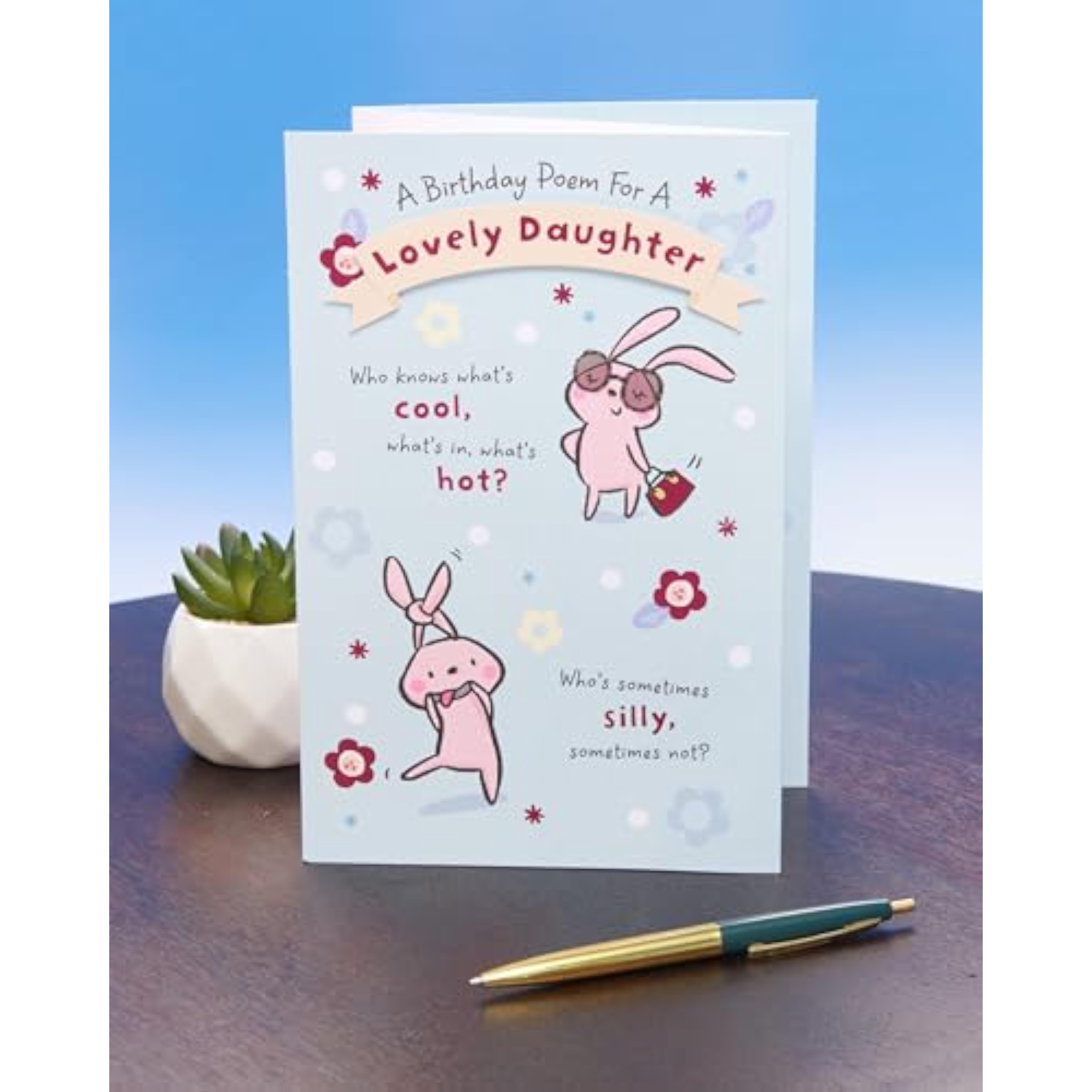UK Greetings birthday card for daughter featuring a pop-up design with a heartfelt poem and vibrant illustrations.