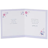 UK Greetings birthday card for girlfriend featuring a flower heart design with colorful floral artwork.