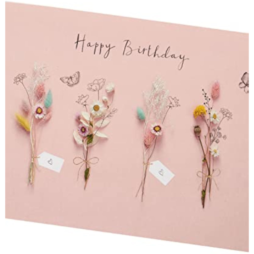 UK Greetings birthday card for her featuring a dried flower design, with an envelope, perfect for female friends.