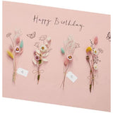 UK Greetings birthday card for her featuring a dried flower design, with an envelope, perfect for female friends.