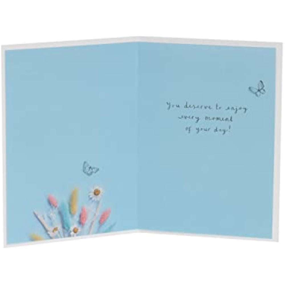 UK Greetings birthday card for her featuring a flower stem design, includes envelope, perfect for female friends.