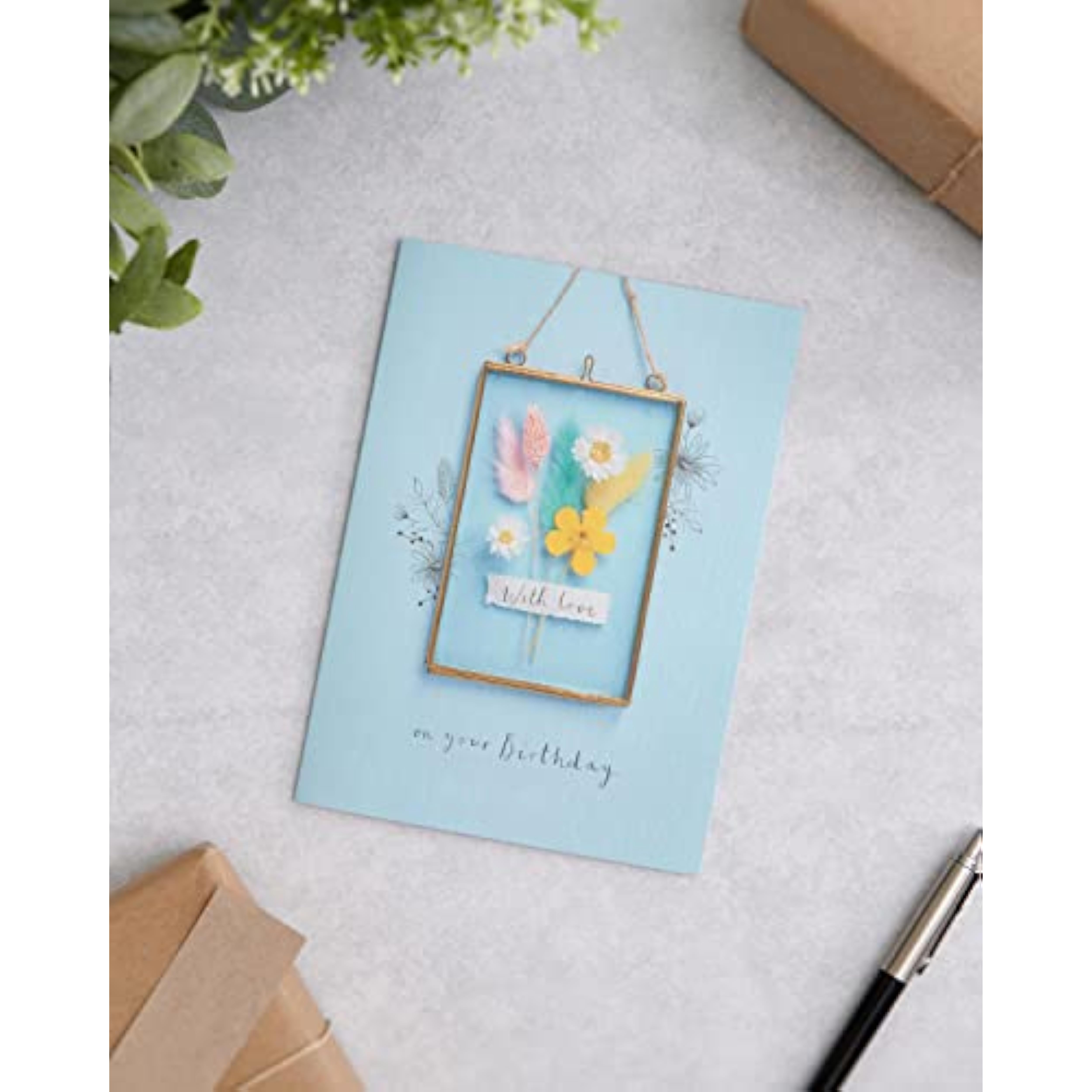 UK Greetings birthday card for her featuring a framed floral design, includes envelope, perfect for female friends.