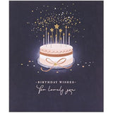 UK Greetings birthday card for her featuring a starry cake design, includes an envelope, perfect for female friends.
