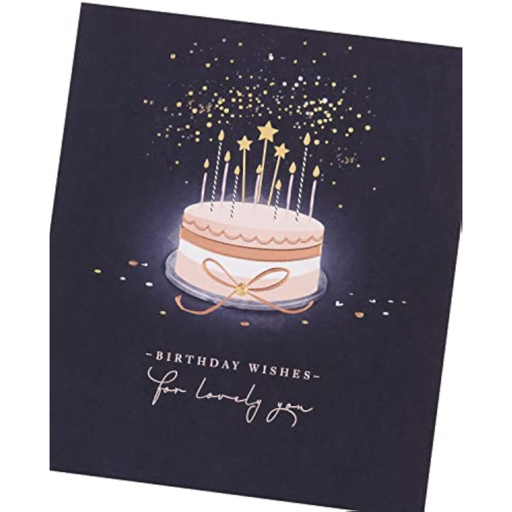 UK Greetings birthday card for her featuring a starry cake design, with a matching envelope, ideal for female friends.