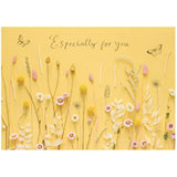 UK Greetings birthday card for her featuring a warm flower design, includes envelope, perfect for female friends.