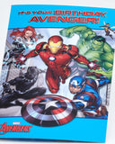 Colorful Avengers design UK Greetings birthday card for him or boy with envelope, featuring superhero characters and vibrant illustrations.