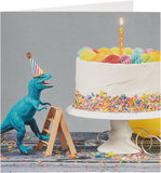 UK Greetings birthday card for him or friend featuring colorful cake and dinosaur design, perfect for celebrating birthdays.