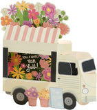 UK Greetings birthday card for mum featuring a pop-up flower truck design, with colorful floral elements and cheerful artwork.