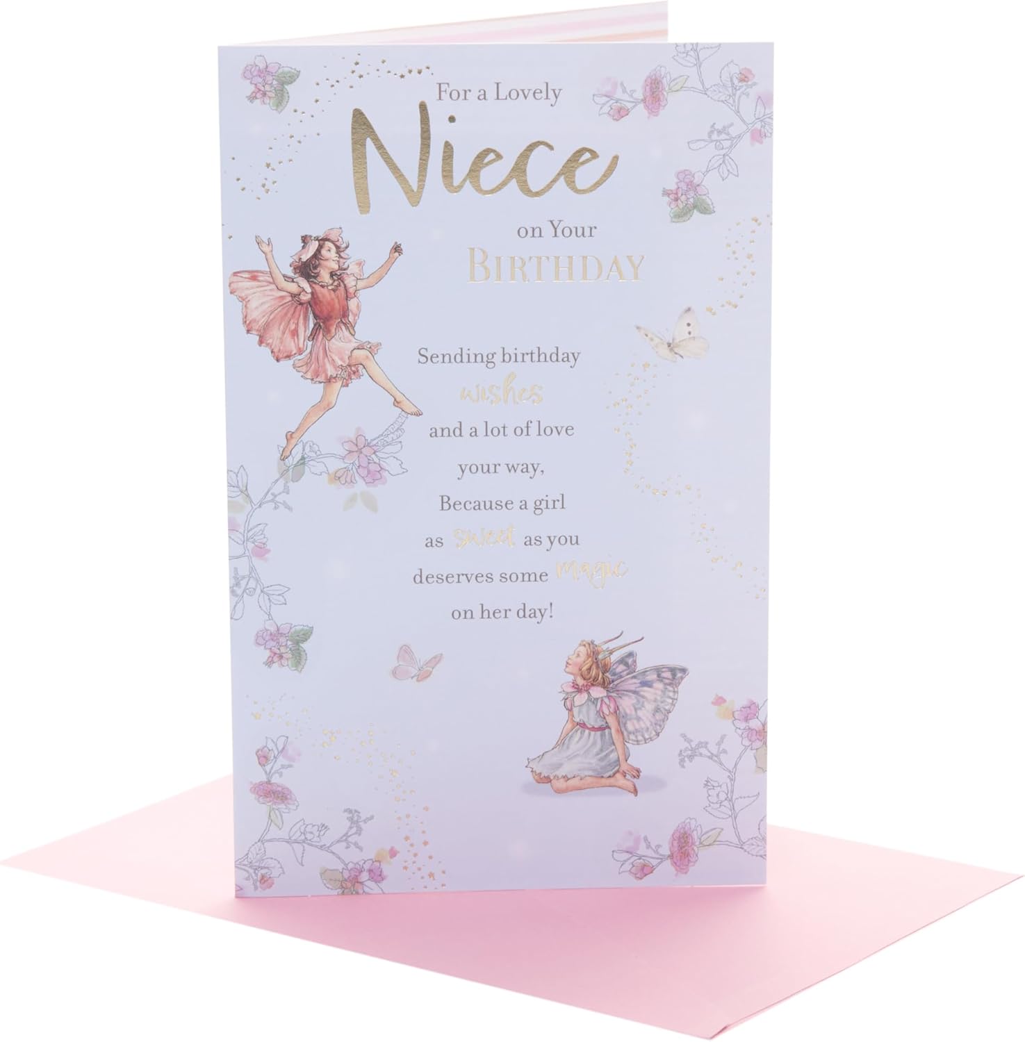 UK Greetings birthday card for niece featuring a whimsical fairies design, decorated with colorful fairy illustrations.