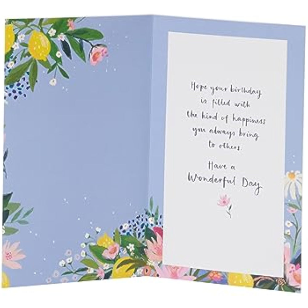 UK Greetings birthday card for sister with floral border design, featuring colorful flowers and heartfelt birthday message.