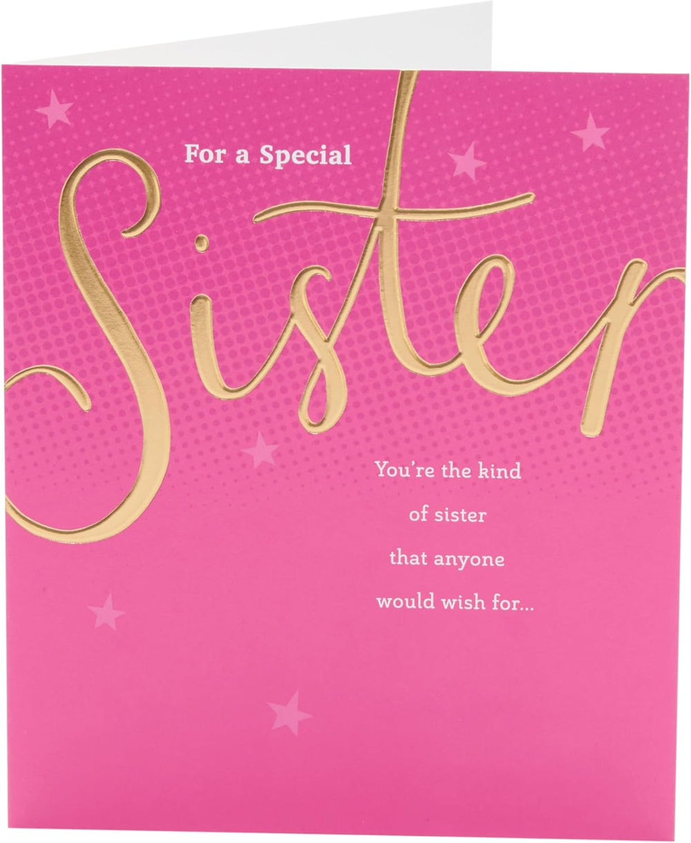 UK Greetings birthday card for sister featuring a pink and gold design, showcasing a festive greeting card with floral accents.