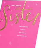 UK Greetings birthday card for sister featuring a pink and gold design, showcasing a festive greeting card with elegant details.