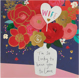 UK Greetings birthday card for wife featuring a vase with a colorful bouquet design, perfect for celebrating special occasions.