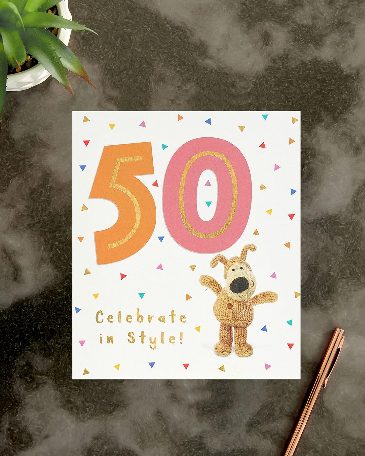UK Greetings Boofle 50th Birthday Card featuring colorful illustrations of Boofle for celebrating a 50th birthday.