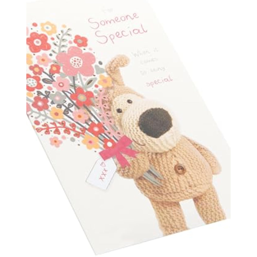 UK Greetings Boofle holding flowers birthday greeting card featuring colorful floral design and cute character illustration.
