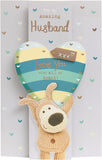 UK Greetings Boofle husband birthday card featuring Boofle holding a heart above his head, perfect for celebrating special occasions.