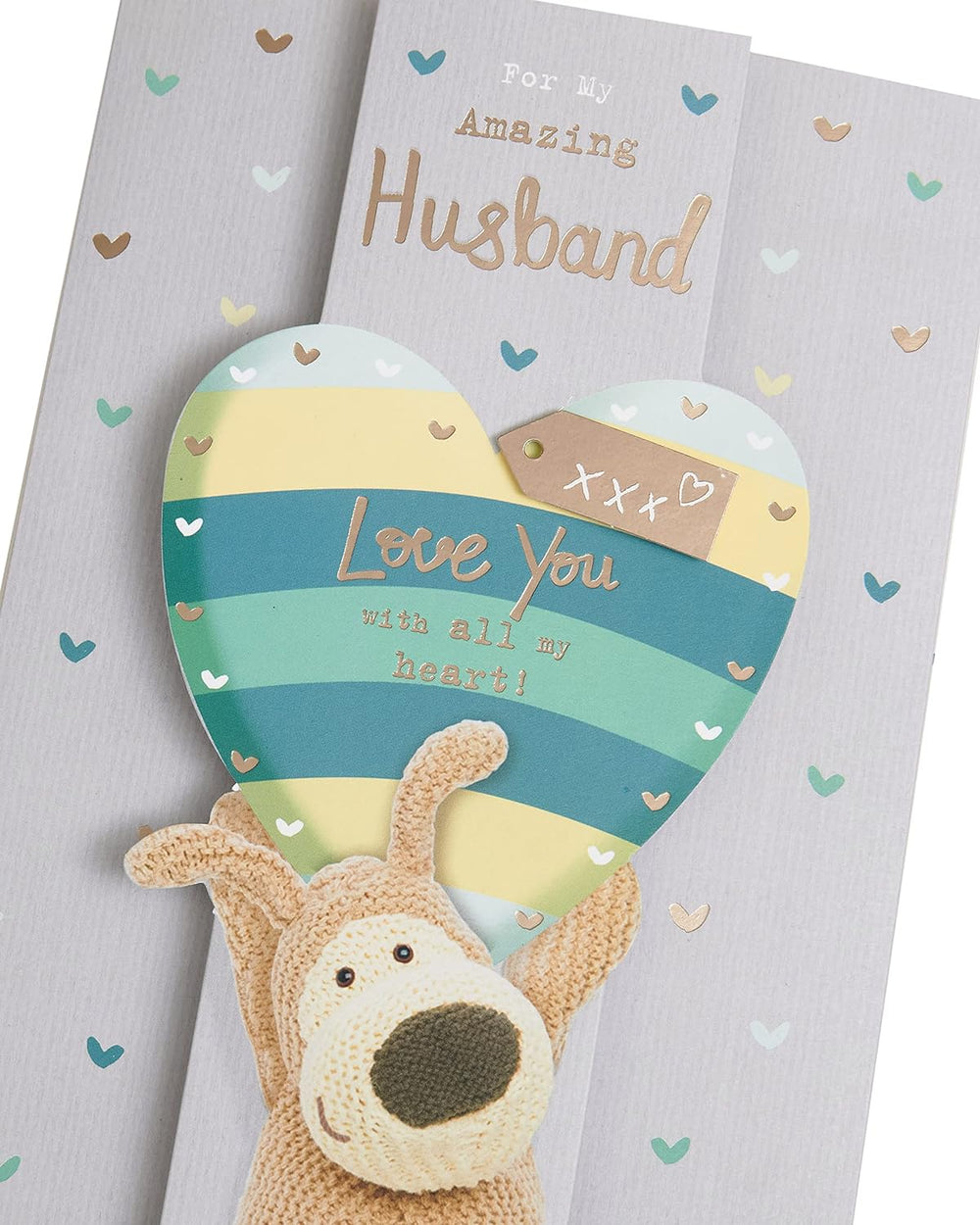 UK Greetings Boofle holding a heart above his head on a birthday card for husband, a cheerful greeting card design.