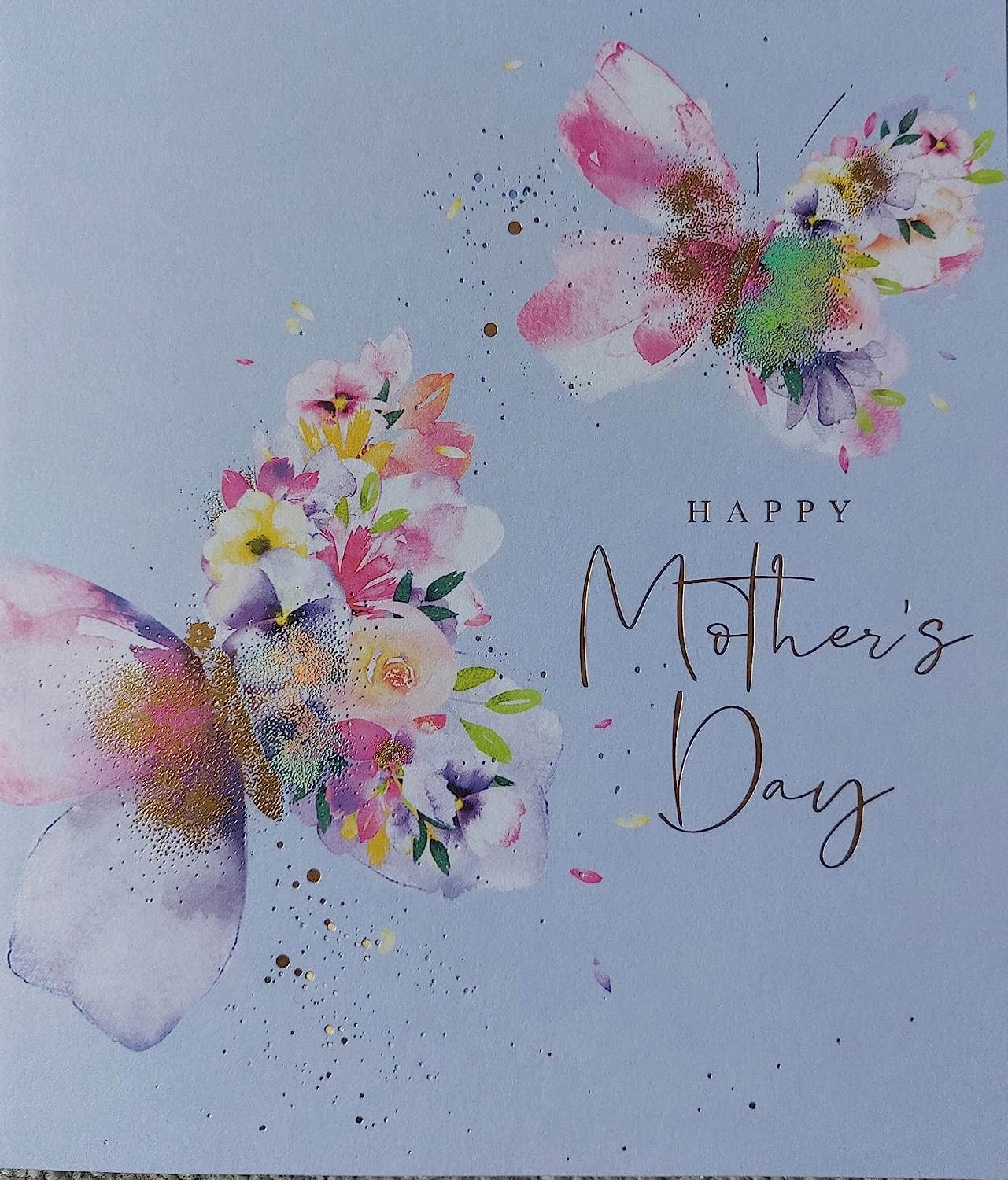 UK Greetings Butterflies Happy Mother's Day Card featuring colorful butterfly illustrations and heartfelt message inside.